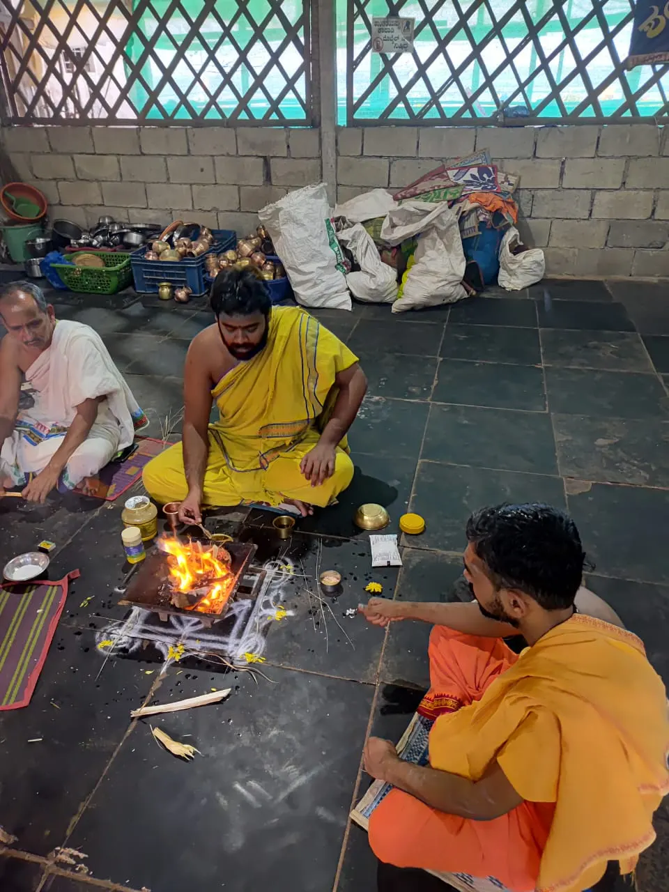 Ghee being offered into the sacred fire